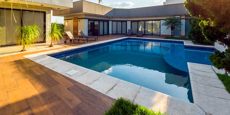 Create an Oasis of Tranquility with These Amazing Custom Pool Deck Features